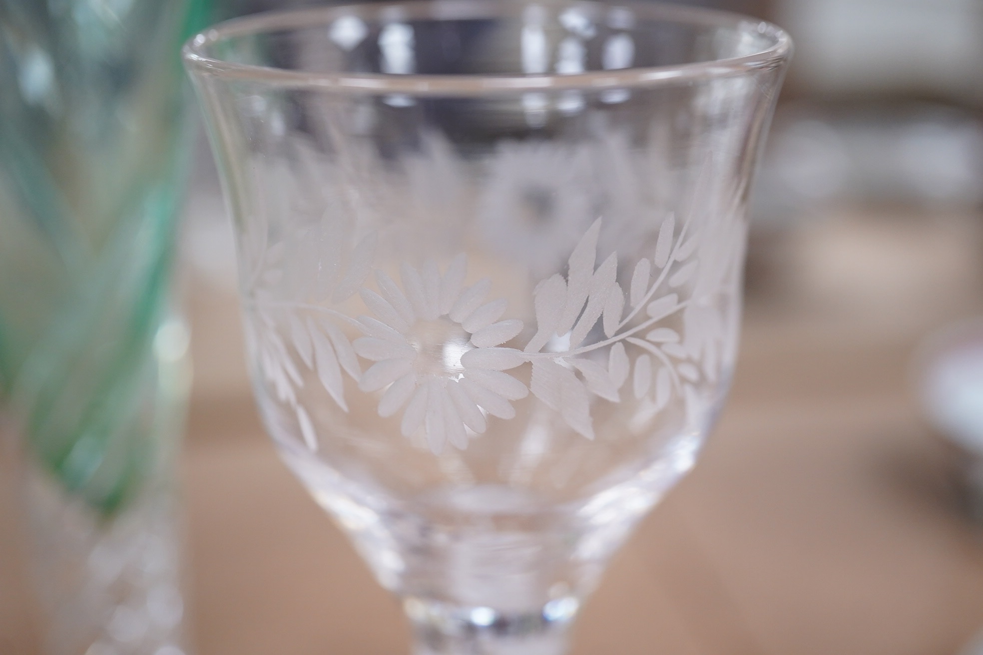 Five 18th / 19th century style wine and cordial glasses, some with air twist stems, together with a jug, largest 23cm high. Condition - good